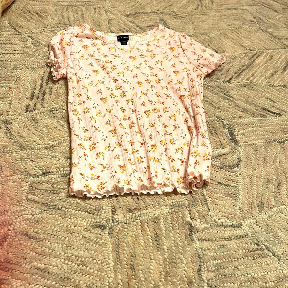 Pink top with flowers and V-neck